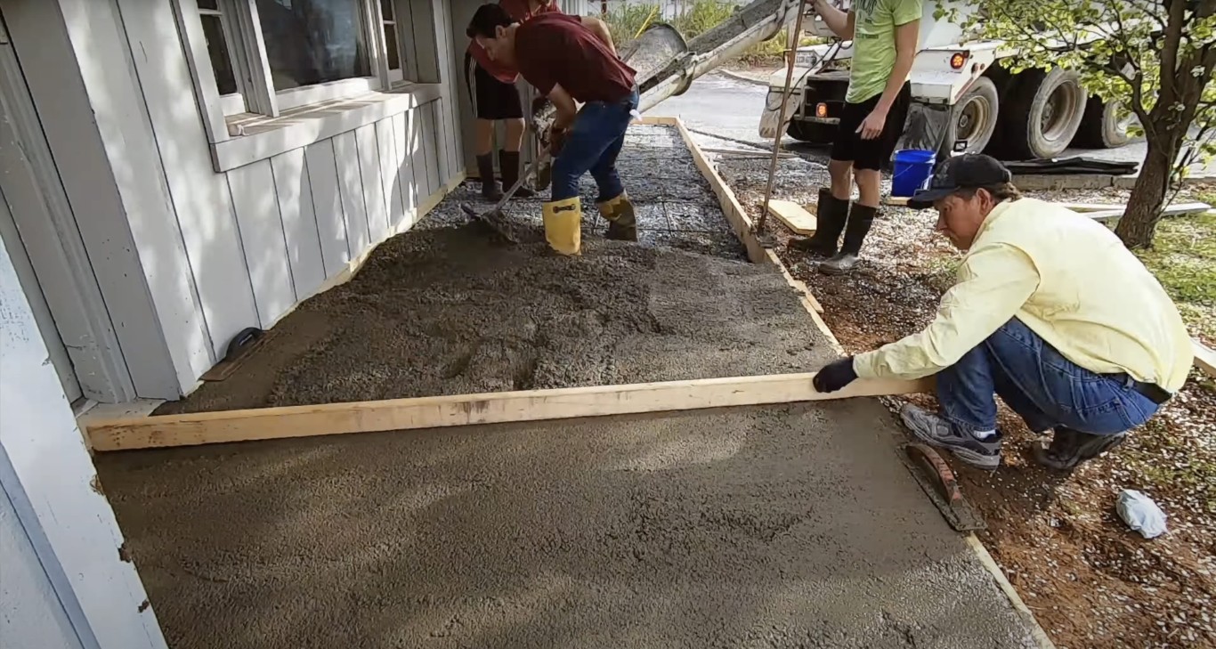 Professional concrete installation crew working in Council Bluffs, IA